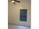 Bedroom featuring a modern ceiling fan and window, ensuring comfort and natural light at 708 E Broadway St, Fort Meade, FL 33841