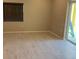 Bright and airy living room with tile flooring and sliding glass doors to the outside at 708 E Broadway St, Fort Meade, FL 33841