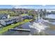 Aerial view of lakeside townhomes with docks, perfect for enjoying waterfront living at 900 Avenue Z Se # A3, Winter Haven, FL 33880