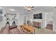Living room with an open floor plan, tiled flooring, and natural light at 900 Avenue Z Se # A3, Winter Haven, FL 33880