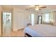 Calm bedroom with wood floors, a ceiling fan, and natural light from the windows at 919 Avenue S Se, Winter Haven, FL 33880