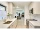 Updated kitchen featuring stylish white cabinets, stainless steel appliances, and an open design at 919 Avenue S Se, Winter Haven, FL 33880