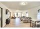 Open living room showcasing modern decor, a large sectional sofa, and views of the backyard at 919 Avenue S Se, Winter Haven, FL 33880