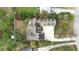 An aerial view of a grand home with ample parking, lush landscaping, and a well-maintained roof at 926 S Lakeshore Blvd, Lake Wales, FL 33853