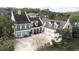 Aerial view of a large home with an expansive driveway and three-car garage at 926 S Lakeshore Blvd, Lake Wales, FL 33853
