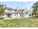Exterior of a home with a large backyard and concrete patio at 926 S Lakeshore Blvd, Lake Wales, FL 33853
