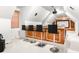 Entertainment room with bar, barstools, projector screen, and ceiling mounted speakers at 926 S Lakeshore Blvd, Lake Wales, FL 33853