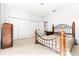 Bedroom with neutral walls, carpet, large closet, and natural light at 926 S Lakeshore Blvd, Lake Wales, FL 33853