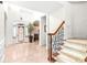 Spacious foyer with tile flooring and elegant staircase at 926 S Lakeshore Blvd, Lake Wales, FL 33853