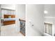 Upstairs hallway overlooking bedroom with wooden bed frame and carpeted floor at 926 S Lakeshore Blvd, Lake Wales, FL 33853