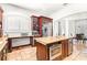 Spacious kitchen features a central island with granite countertops and stainless steel appliances at 926 S Lakeshore Blvd, Lake Wales, FL 33853