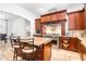 Gourmet kitchen featuring high-end appliances, custom cabinetry and island seating at 926 S Lakeshore Blvd, Lake Wales, FL 33853