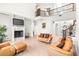 Bright living room with fireplace and tile floors at 926 S Lakeshore Blvd, Lake Wales, FL 33853