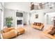 Elegant living room with a fireplace and leather furniture at 926 S Lakeshore Blvd, Lake Wales, FL 33853