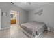 Bedroom with ensuite bathroom access and tile flooring at 991 Old Scenic Hwy, Lake Wales, FL 33853