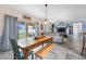 An open dining area leading to the patio offers seamless indoor-outdoor living at 10234 Lenox St, Clermont, FL 34711