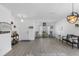 Bright living room with light floors, contemporary furnishings, and a welcoming ambiance at 10234 Lenox St, Clermont, FL 34711