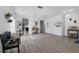 Inviting living room showcasing modern floors, stylish accents, and an open layout at 10234 Lenox St, Clermont, FL 34711