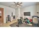 Dedicated workout room with exercise bike, treadmill, and ample space for fitness equipment at 1091 Sugarwood St, Davenport, FL 33837