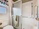 Bathroom featuring a shower with glass door and a hand shower fixture at 11 Sun Air Blvd E, Haines City, FL 33844