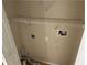 This laundry room includes wire shelving and hookups for your washer and dryer at 1106 Partridge Way, Kissimmee, FL 34759
