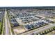 Aerial view showcases a home in a well-planned community with lush landscaping at 1108 Zion Dr, Haines City, FL 33844