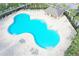 Aerial view of the community's large, uniquely shaped pool and lounge area at 1108 Zion Dr, Haines City, FL 33844