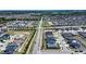 Wide aerial view of the community with nearby lakes and winding roads at 1108 Zion Dr, Haines City, FL 33844