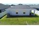 Aerial view of backyard with lush lawn and full fencing at 1108 Zion Dr, Haines City, FL 33844