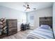 Well-lit bedroom with functional furniture, wooden accents, and neutral colors for a calm environment at 1108 Zion Dr, Haines City, FL 33844
