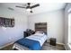 Comfortable bedroom with wood-look floors and stylish ceiling fan at 1108 Zion Dr, Haines City, FL 33844