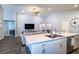 Spacious kitchen island with seating overlooking the living room, perfect for entertaining guests at 1108 Zion Dr, Haines City, FL 33844
