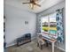 Comfortable home office with scenic view, featuring a desk and ample storage space at 1124 Sawgrass Dr, Winter Haven, FL 33884