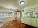 Open-concept kitchen with views into the living and dining areas, great for entertaining at 114 Jana Cir, Auburndale, FL 33823