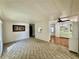 Open-concept living area with easy access to kitchen, great for entertaining at 114 Jana Cir, Auburndale, FL 33823