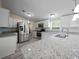 Modern kitchen featuring stainless steel appliances and granite countertops at 1302 Windsong Dr, Lakeland, FL 33811