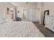 Bright bedroom with closet, light walls and gray carpet at 135 Krenson Bay Loop, Winter Haven, FL 33881
