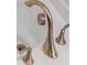 Close up of brushed silver faucet in bathroom sink at 135 Krenson Bay Loop, Winter Haven, FL 33881