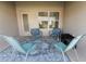 Covered patio featuring outdoor seating and a view of the backyard at 135 Krenson Bay Loop, Winter Haven, FL 33881