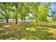 Enjoy a large lot with mature trees and plenty of space for outdoor activities at 151 Lake Ring Dr, Winter Haven, FL 33884
