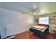 Spacious bedroom features a neutral palette, natural light, and built-in shelves at 151 Lake Ring Dr, Winter Haven, FL 33884