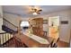 Inviting dining room featuring a wooden table, china cabinet, and stairs leading to the second floor at 151 Lake Ring Dr, Winter Haven, FL 33884