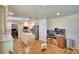 Spacious open-concept kitchen with granite countertops, stainless steel appliances, and center island at 151 Lake Ring Dr, Winter Haven, FL 33884