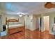 Expansive main bedroom with ceiling fan, closet and hardwood floors at 151 Lake Ring Dr, Winter Haven, FL 33884