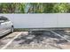 Designated parking space for residence 66 with car parked in space at 1550 11Th Ne St # G6, Winter Haven, FL 33881