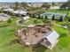 Aerial view of playground with various play structures, covered picnic areas, and surrounding green space at 1744 Cross Prairie Pkwy, Kissimmee, FL 34744