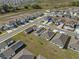Extensive aerial view of single Gathering homes in a new community at 1998 Sarah St, Winter Haven, FL 33884