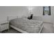 Well-lit bedroom featuring a full-sized bed, desk, and storage, perfect for work and rest at 1998 Sarah St, Winter Haven, FL 33884