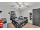 Bedroom with a dark color scheme, featuring LED lighting and simple decor at 210 Pinehurst Dr, Auburndale, FL 33823