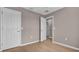 Bedroom with ample closet space, light gray walls and neutral flooring, offering a calm retreat at 225 Babson Dr, Babson Park, FL 33827